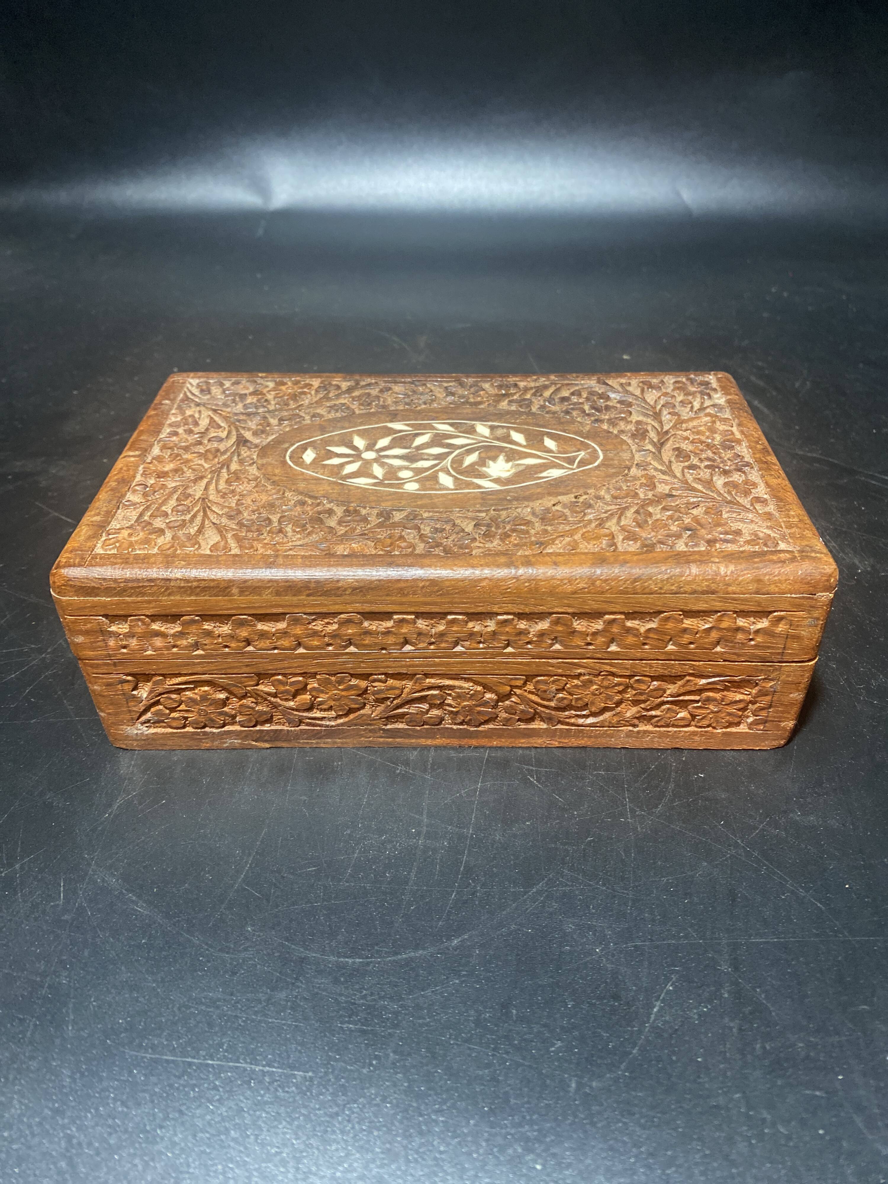 Carved wooden box