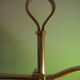 Desk lamp in brass with a swan neck and green opaline glass.