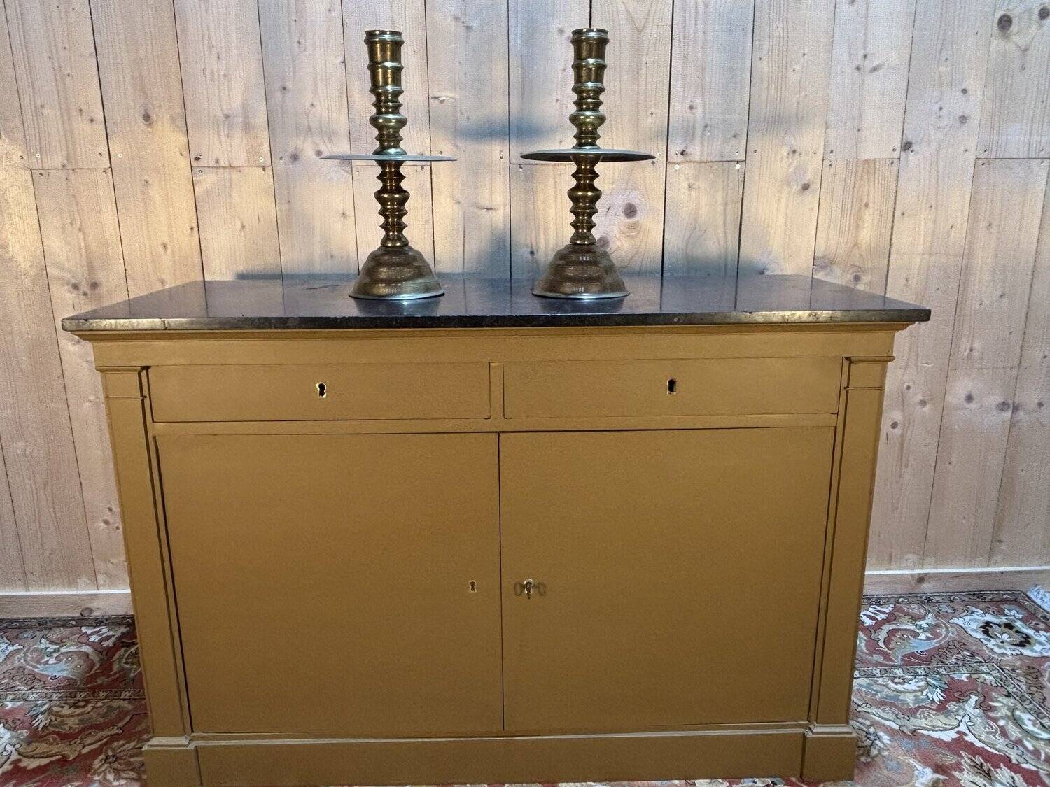 Pair of important brass candle holders