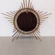 Starry sun mirror in rattan, France around 1960.