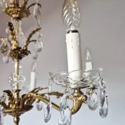 Antique chandelier with pendants, in bronze and glass pendants.
