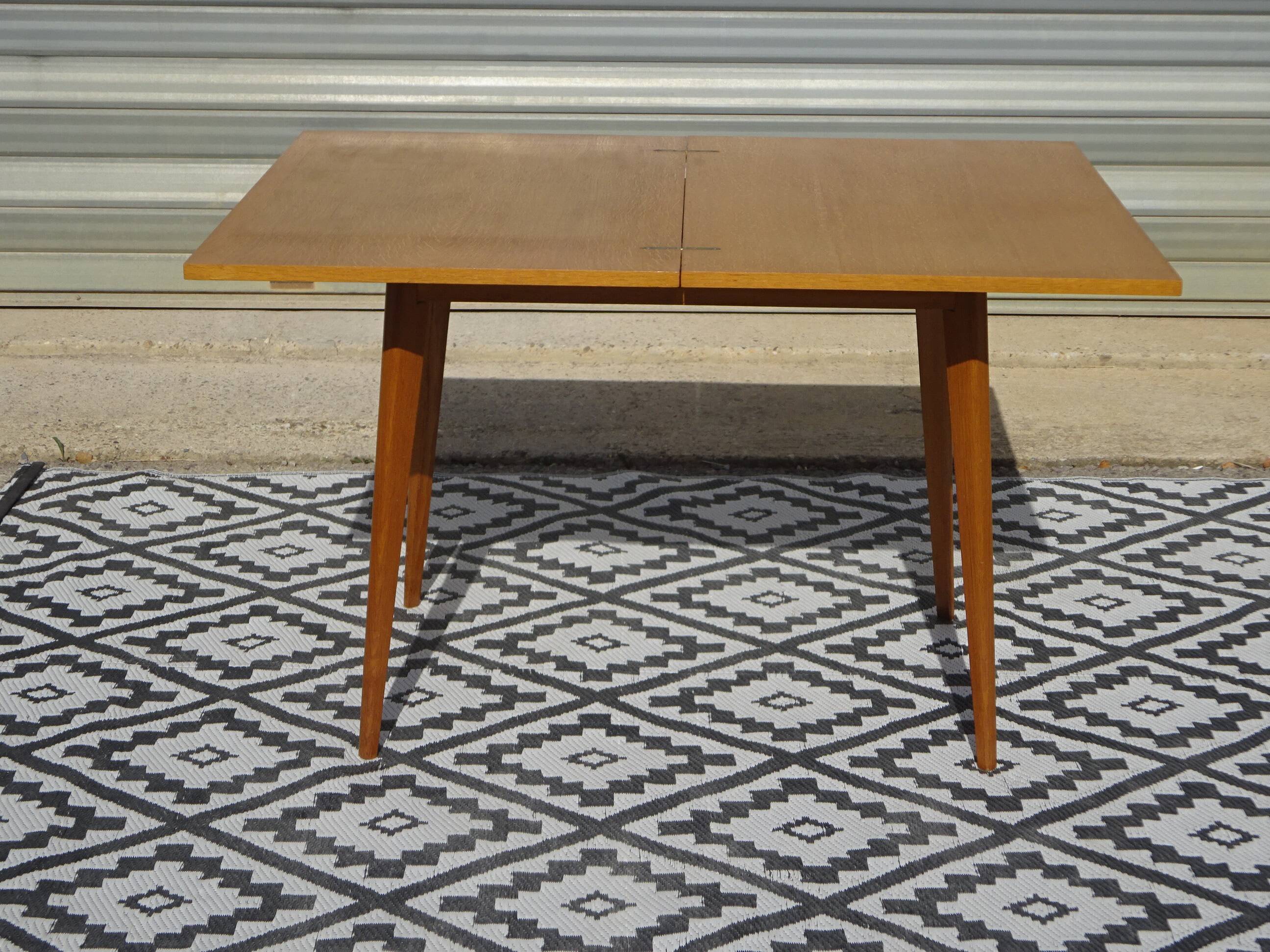 Scandinavian portfolio table model "half-century" by SAM