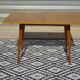 Scandinavian portfolio table model "half-century" by SAM