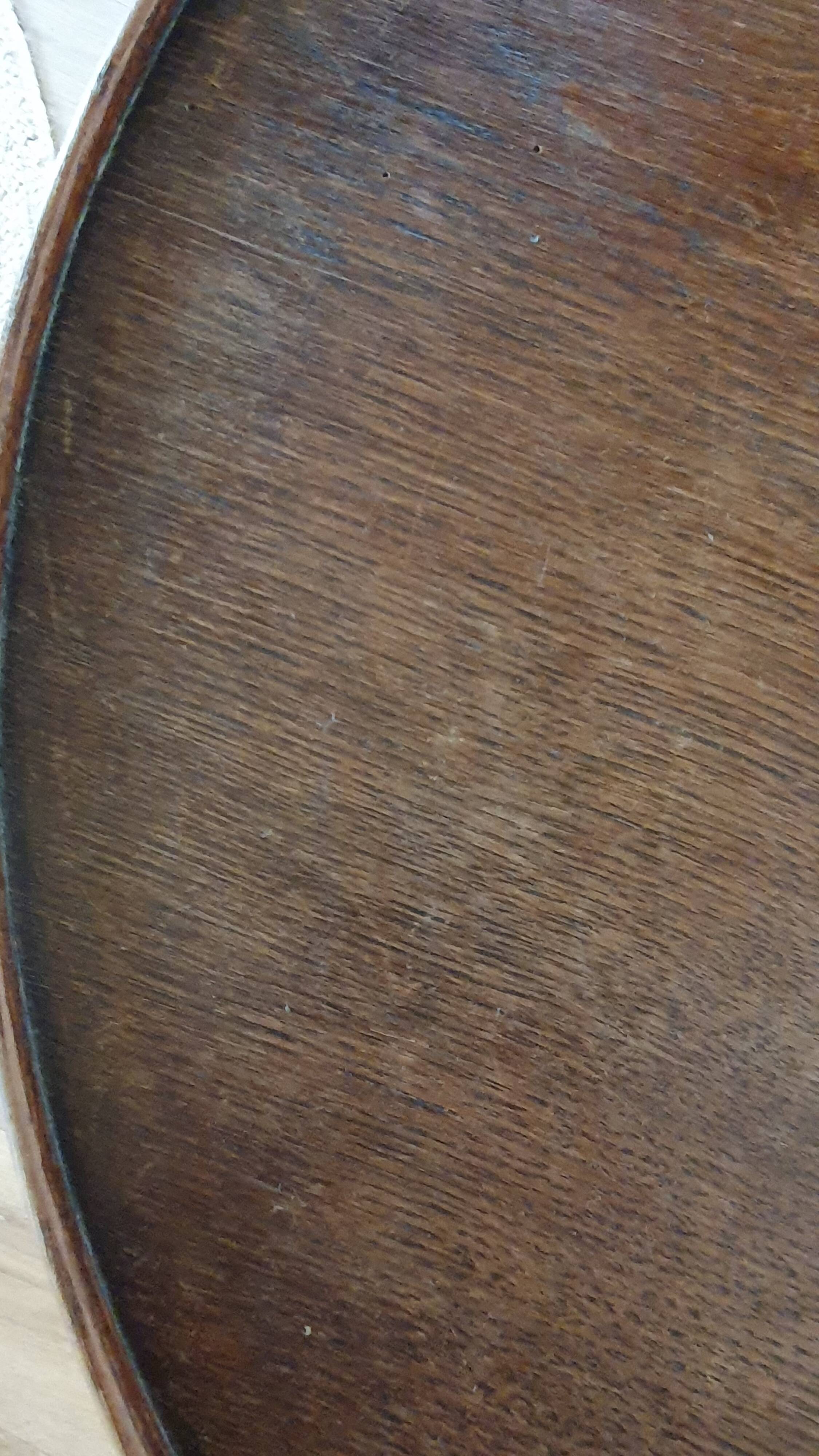 Round wooden table with beaded legs