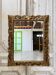 Carved wooden mirror, gilded, 19th century.