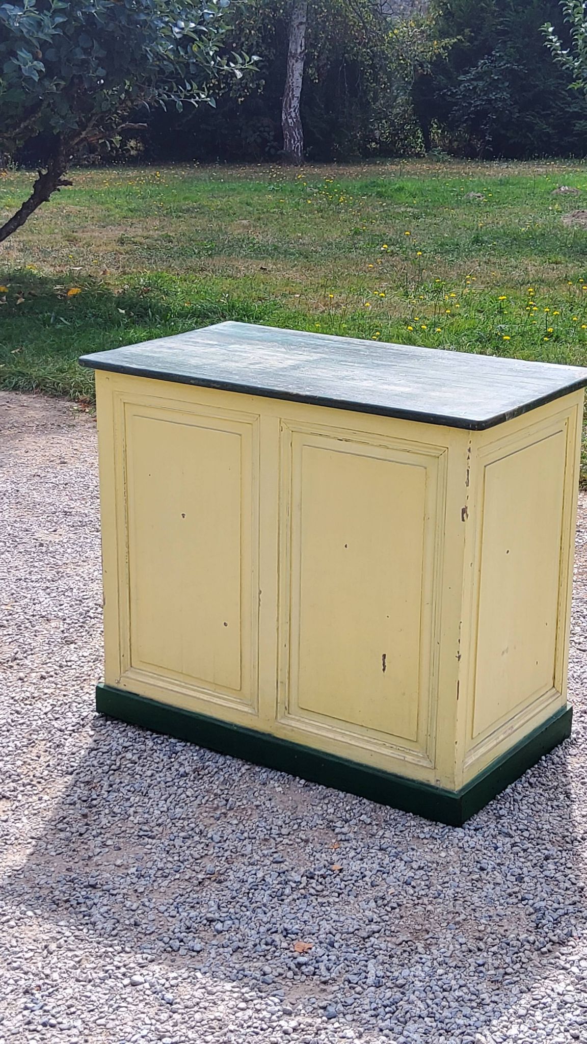 Late 19th century grocery counter in green and yellow patina painted wood