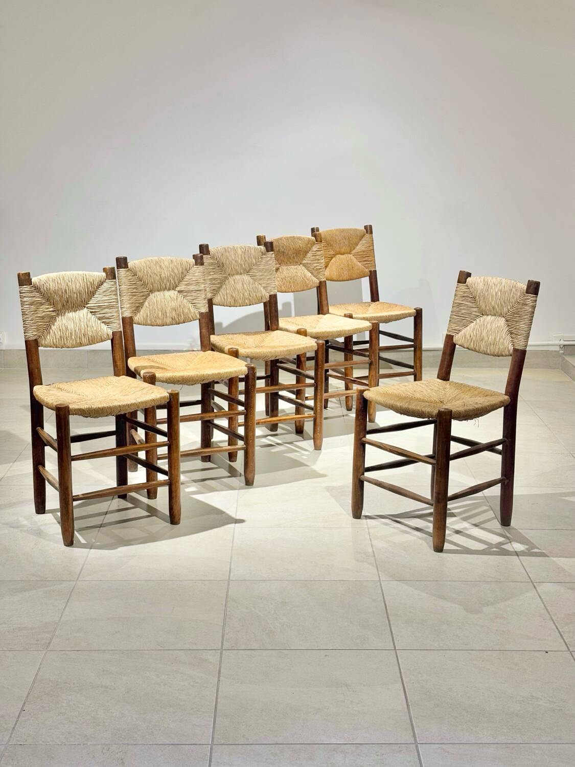 Set of 6 Bauche chairs by Charlotte Perriand