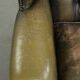 Vintage cowhide leather Chesterfield wingback armchair in a green colour