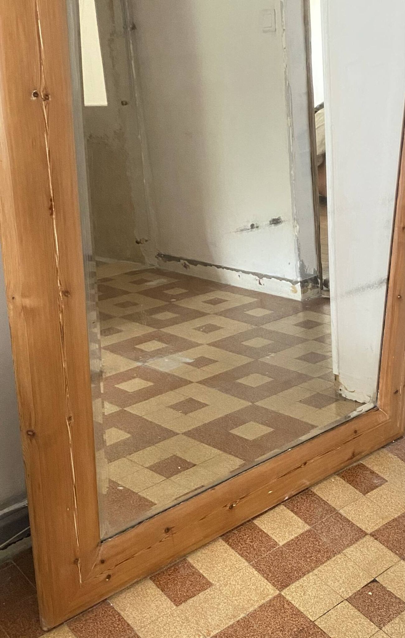 Very large mirror in antique pine.