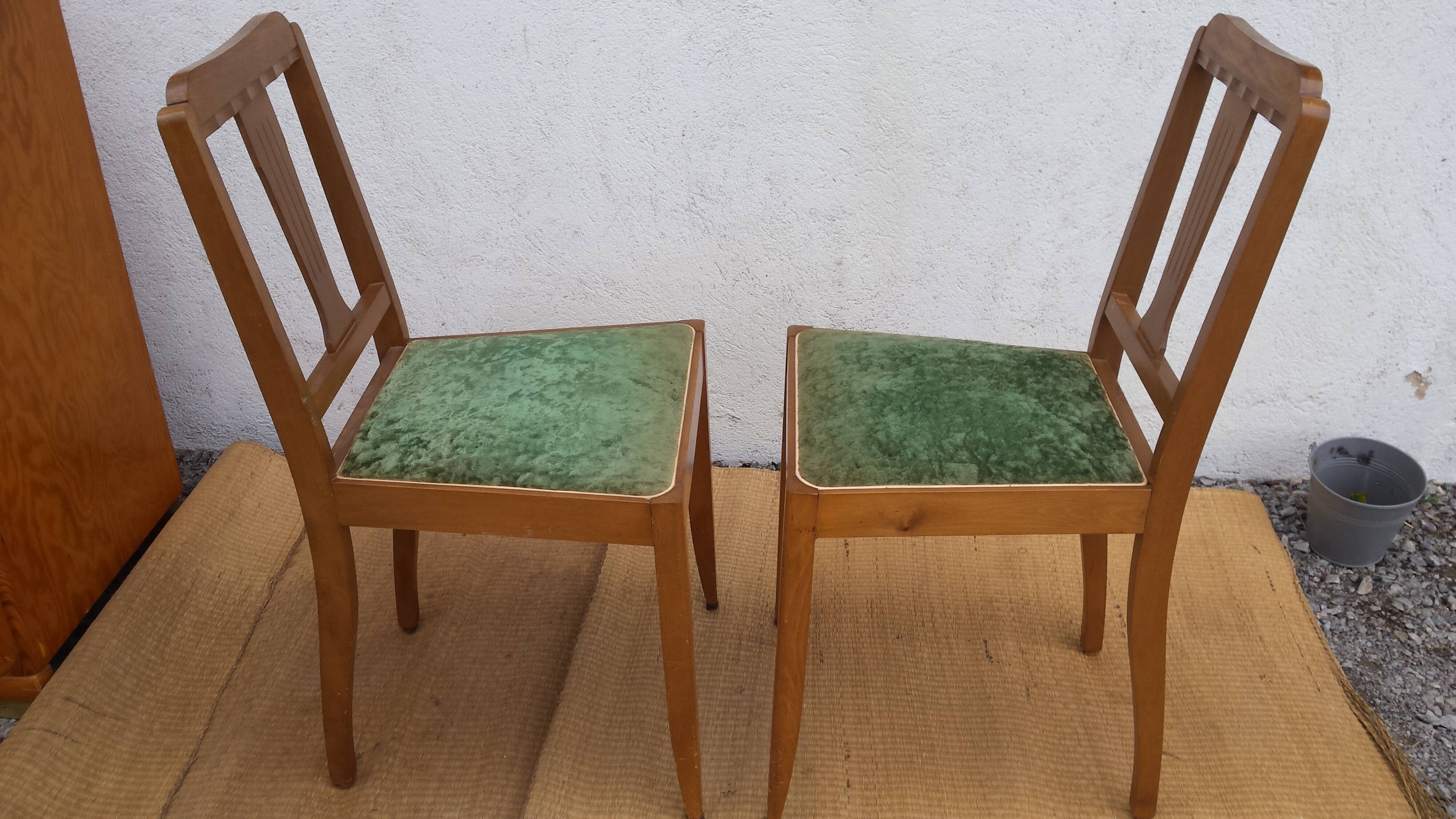 lot of 2 wooden chairs and green velvet