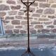 Baumann coat rack on vintage parrot stand