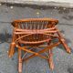 Adult rattan and wicker armchair, 1975, with beige cushion