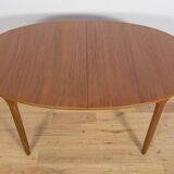 Mid-century extendable oval teak dining table from McIntosh, UK