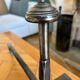 Paire de chenets Art Déco – fer forgé et acier poli, années 1930