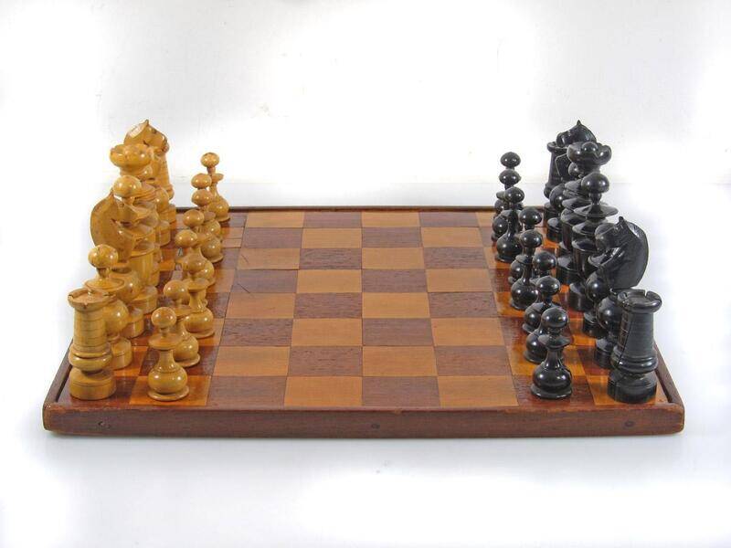 Antique wooden chess set and board