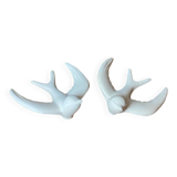 Pair of plaster swallows