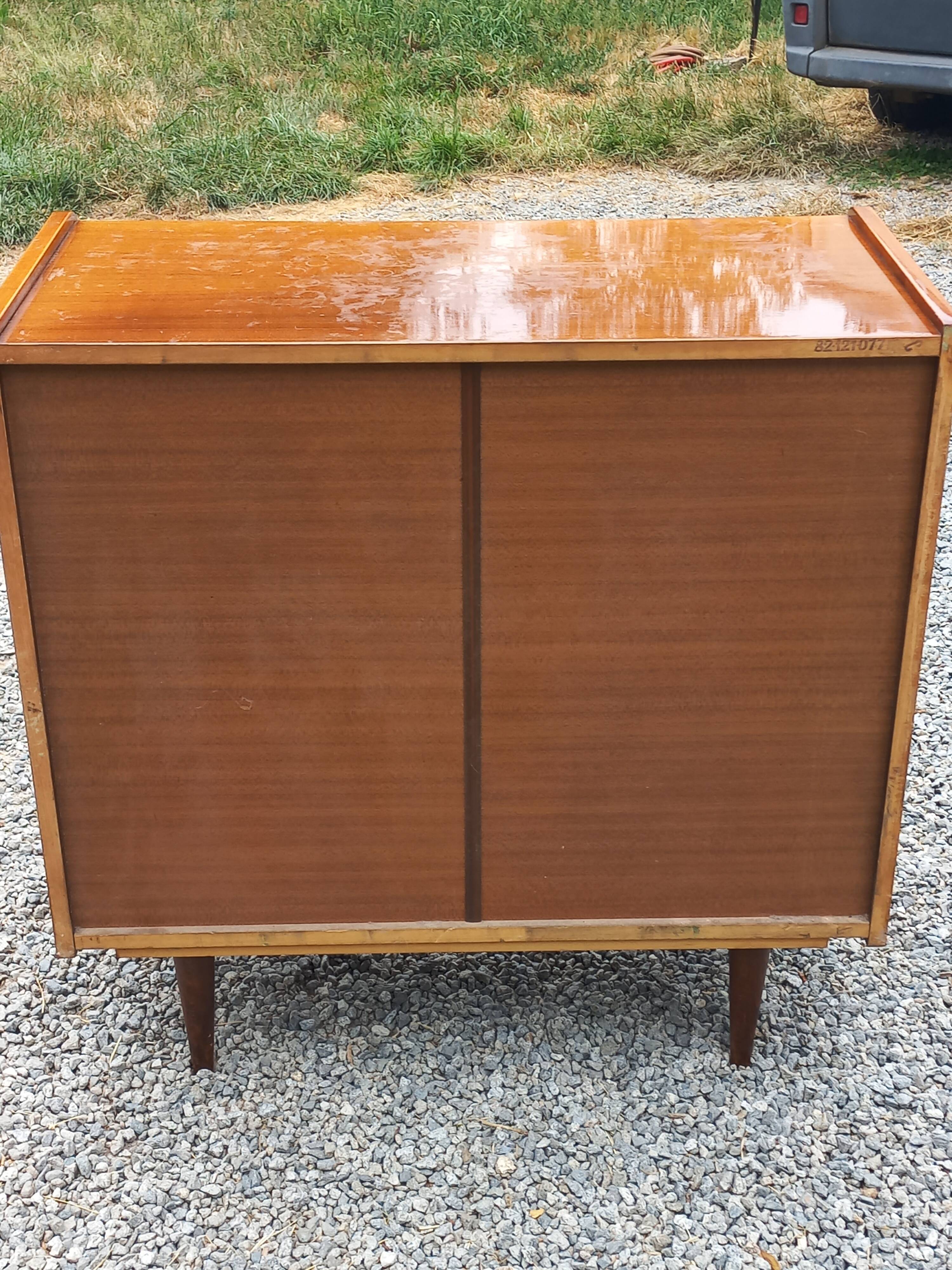 Vintage walnut varnished chest of drawers with 4 drawers from the 1960s.