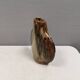 A beautiful Brutalist vase in lovely earth tones. Danish, from the 1980s.