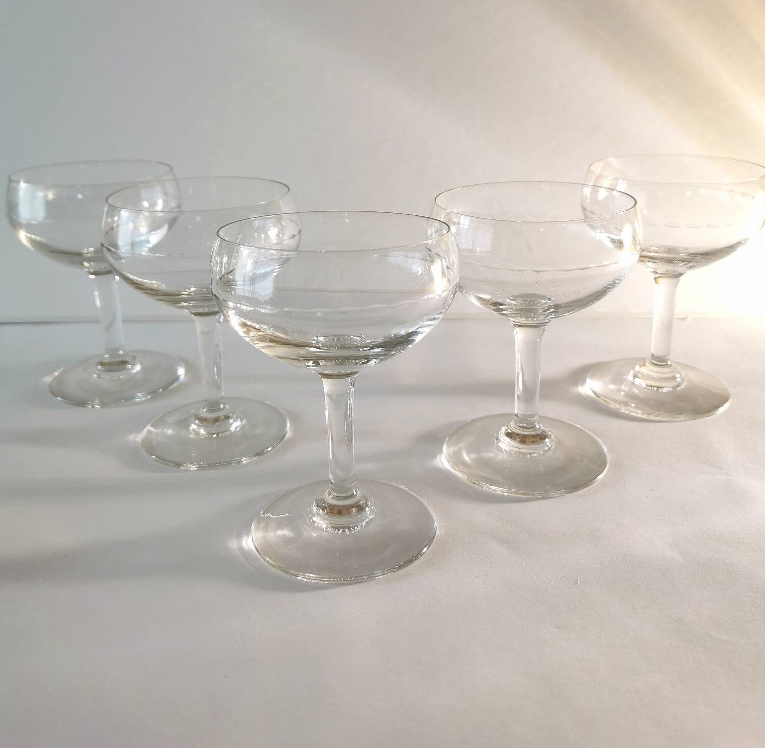 5 Champagne glasses in chiseled glass
