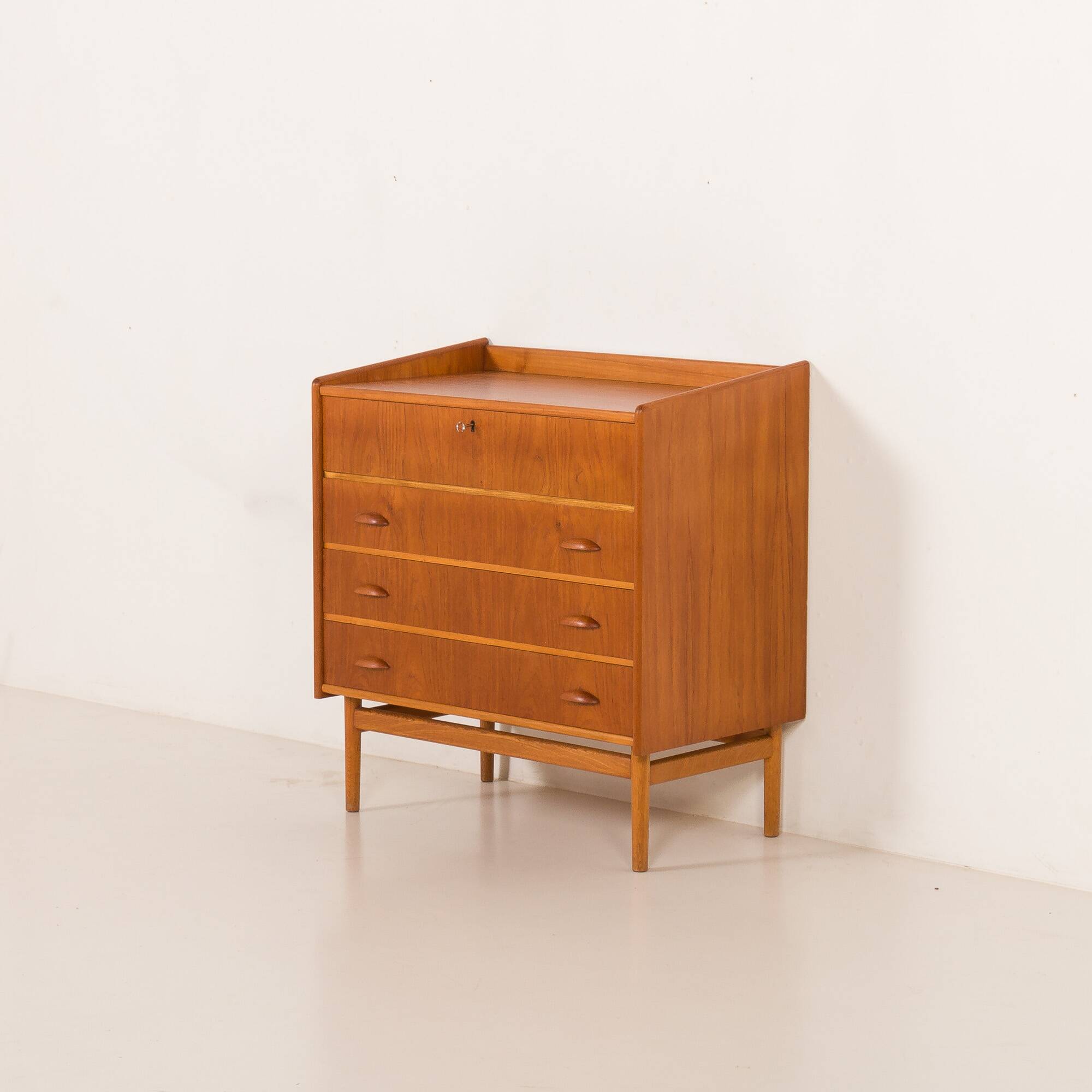 Danish teak dresser with hidden vanity and lights, 1960s