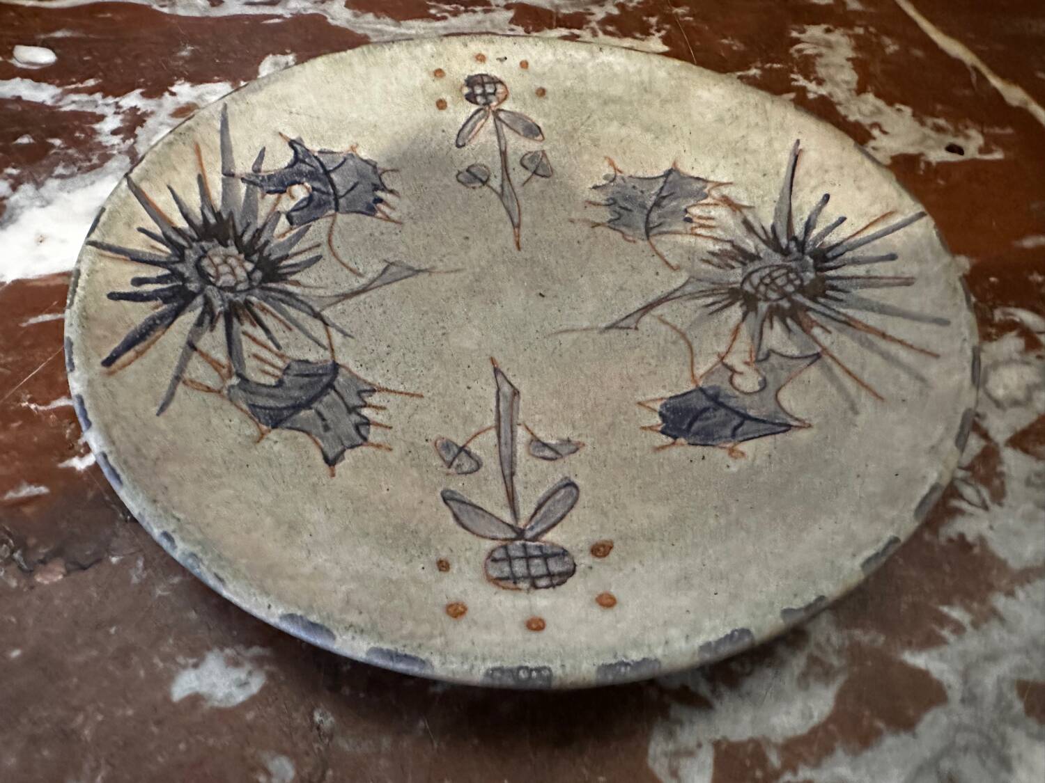 Ceramic plate signed by Marie-Madeleine Jolly – thistle decoration – year