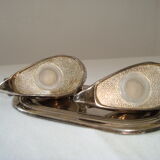 Salt and pepper shaker on silver metal tray in the shape of a duck art deco style