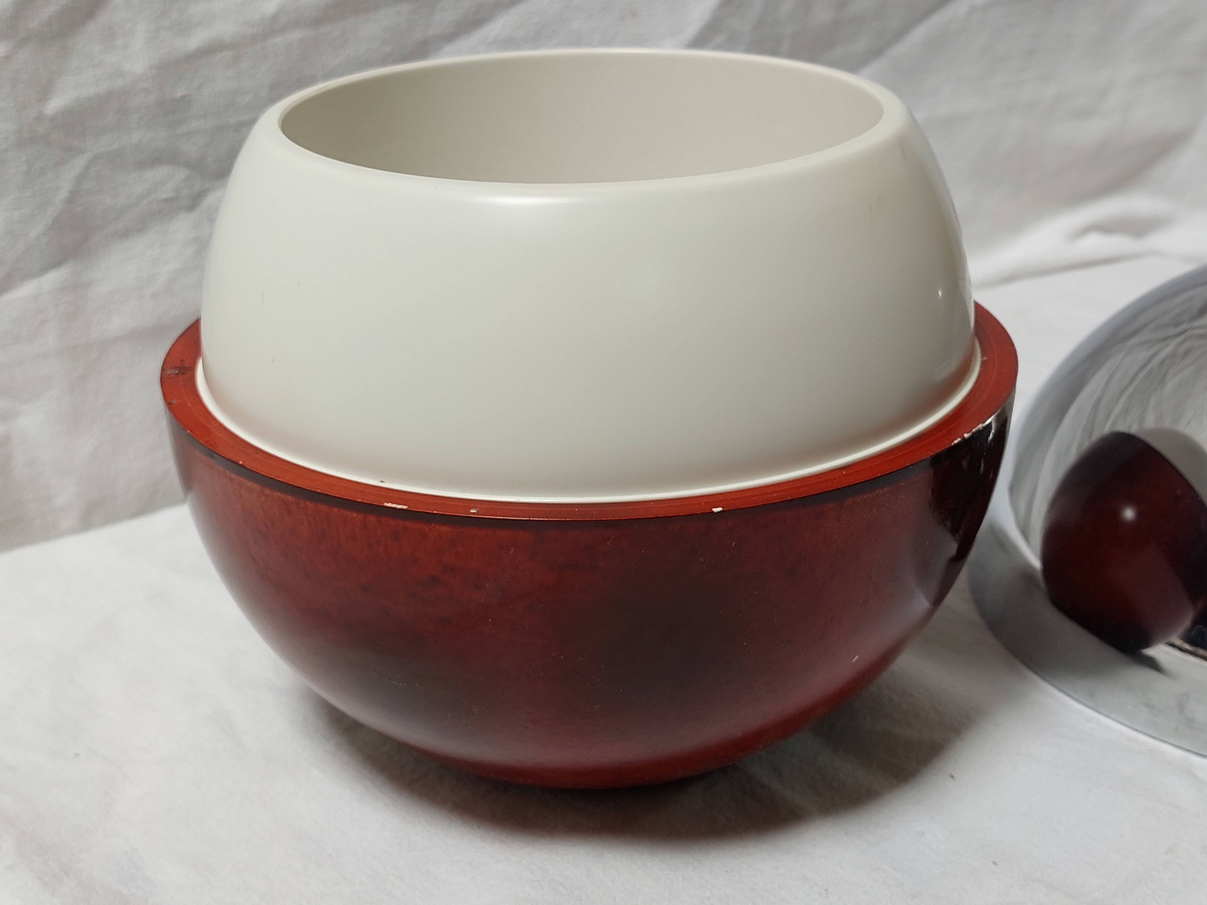 Ice bucket in the shape of an apple, chrome metal and red Bakelite, France, 70s