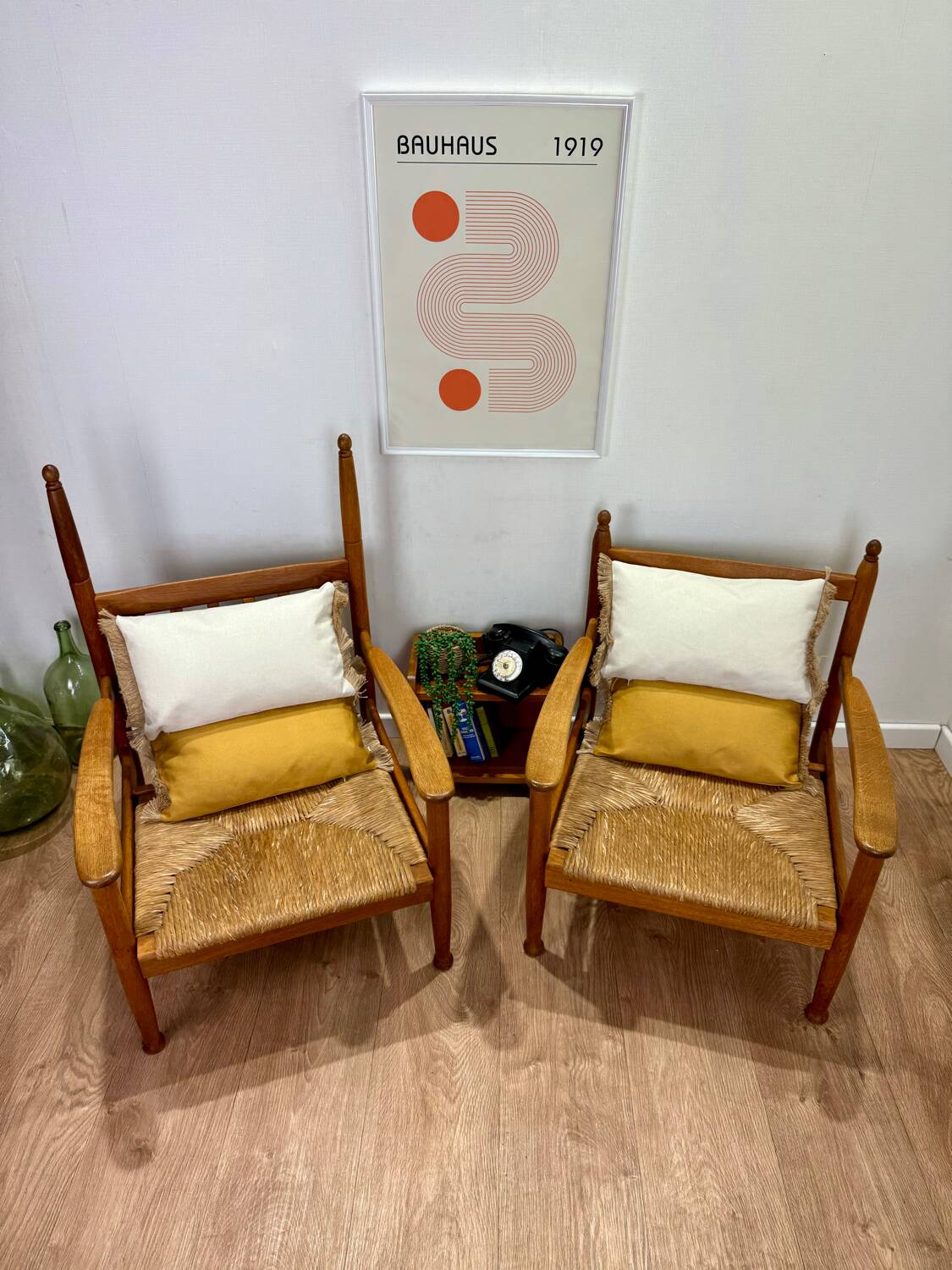 Pair of wooden and straw armchairs