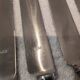 12 silver-plated Empire style table knives 25.3cm