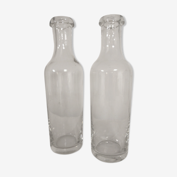 Duo of old glass bottles