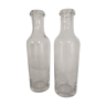 Duo of old glass bottles
