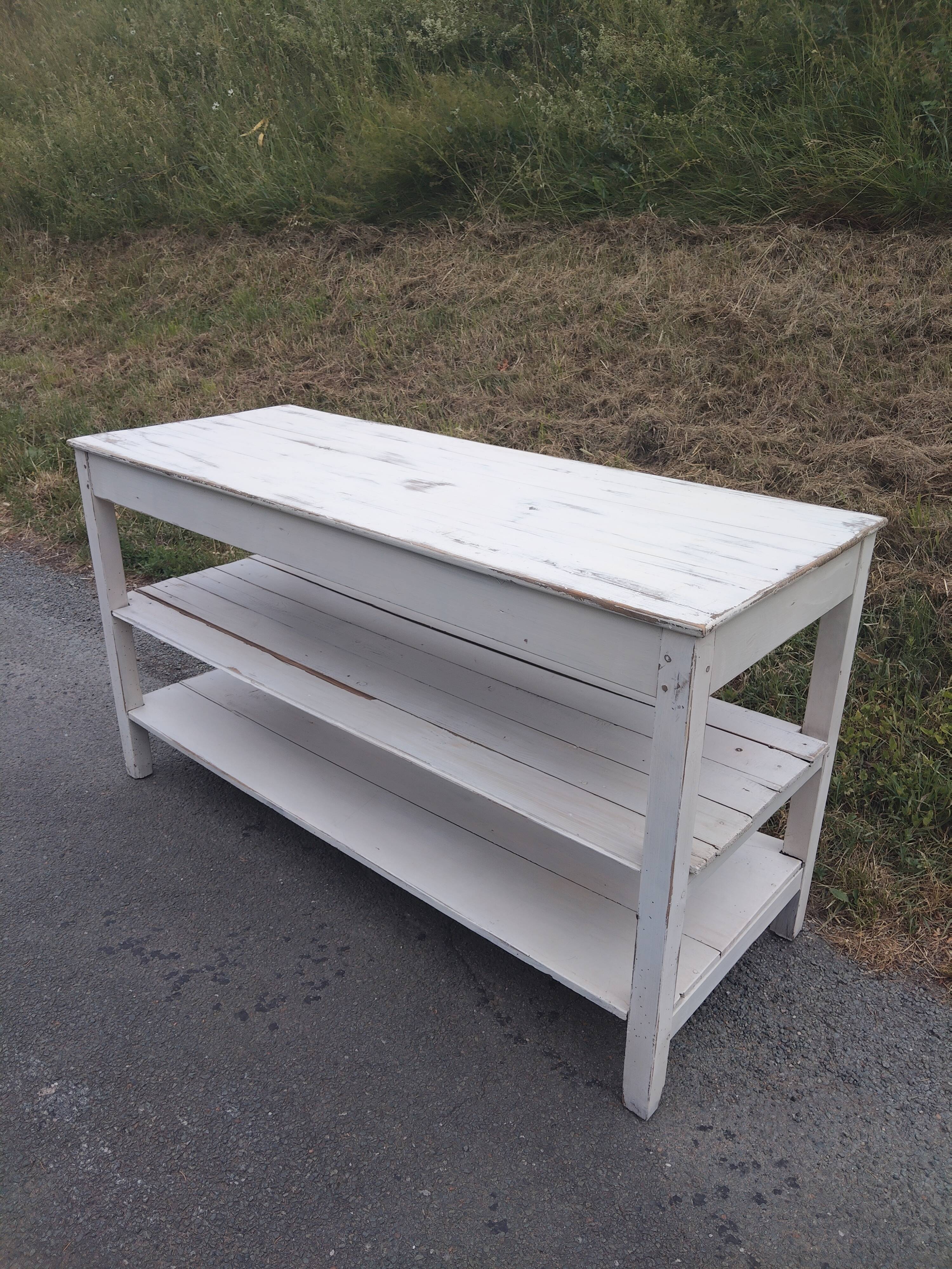Antique white patinated draper's table, florist's wooden console.