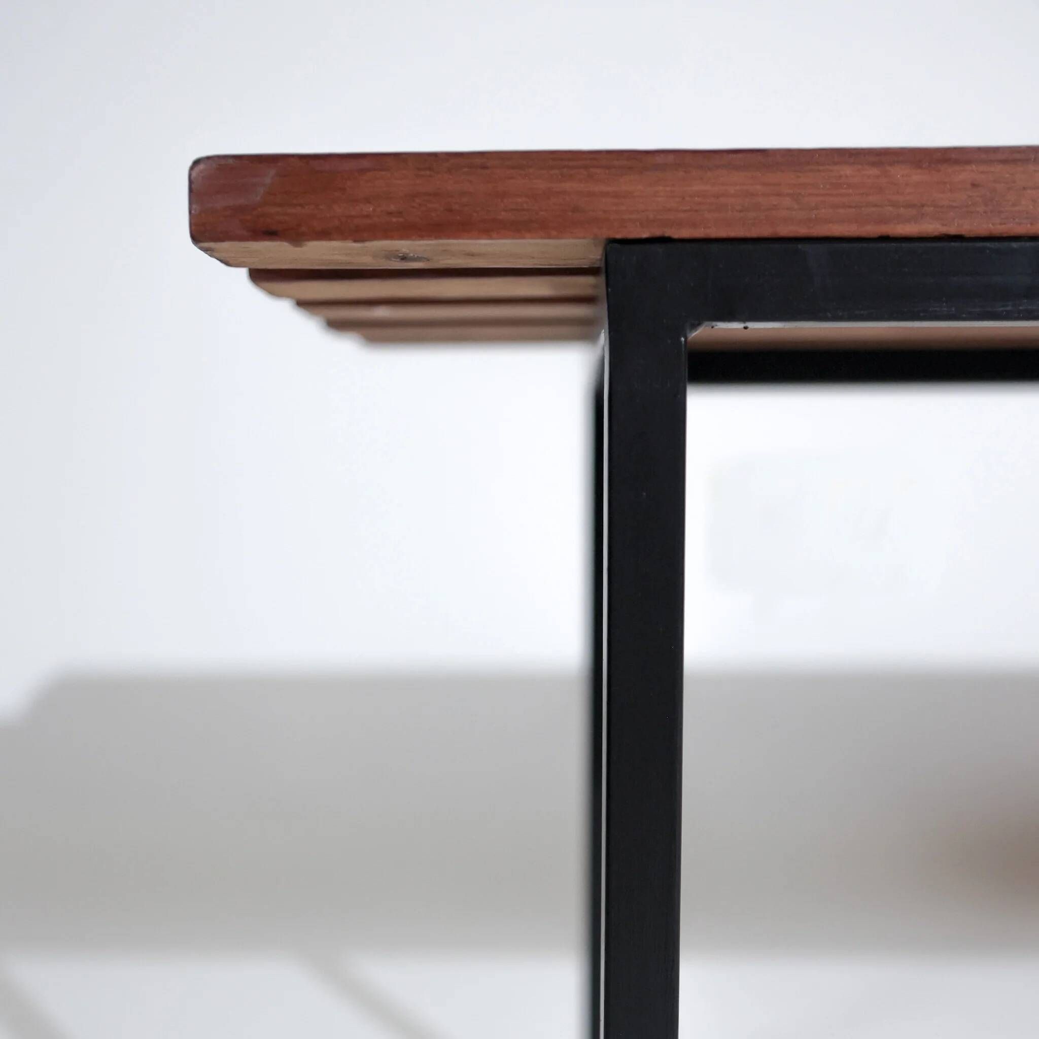 Vintage modernist Italian bench from the mid-century in slatted teak, black metal frame, Italy, 1960s.