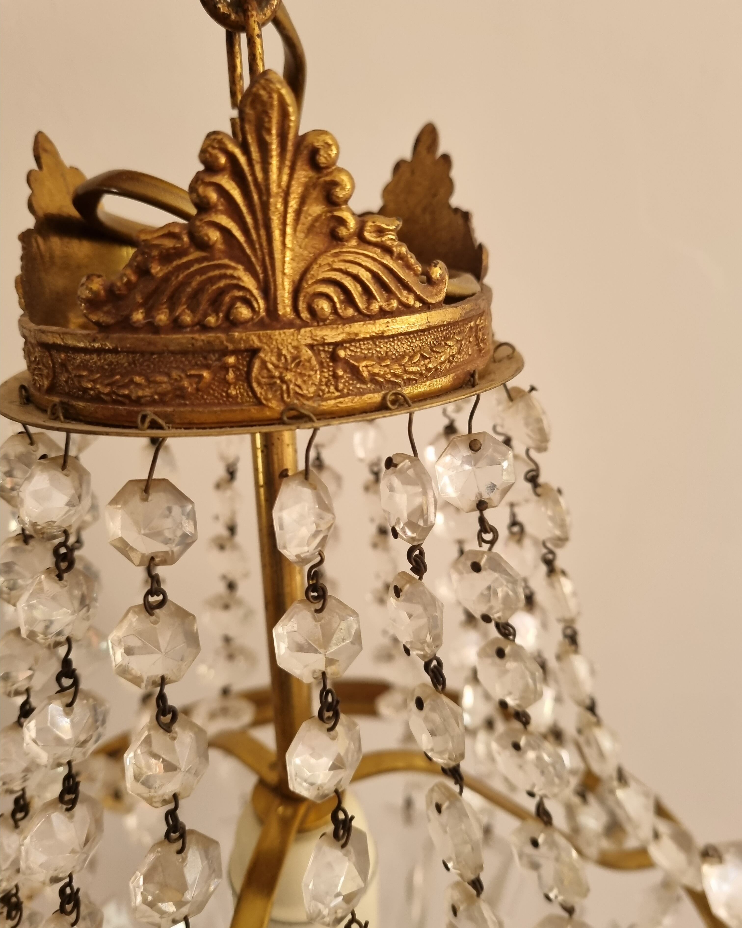 Brass chandelier and grapevine glass