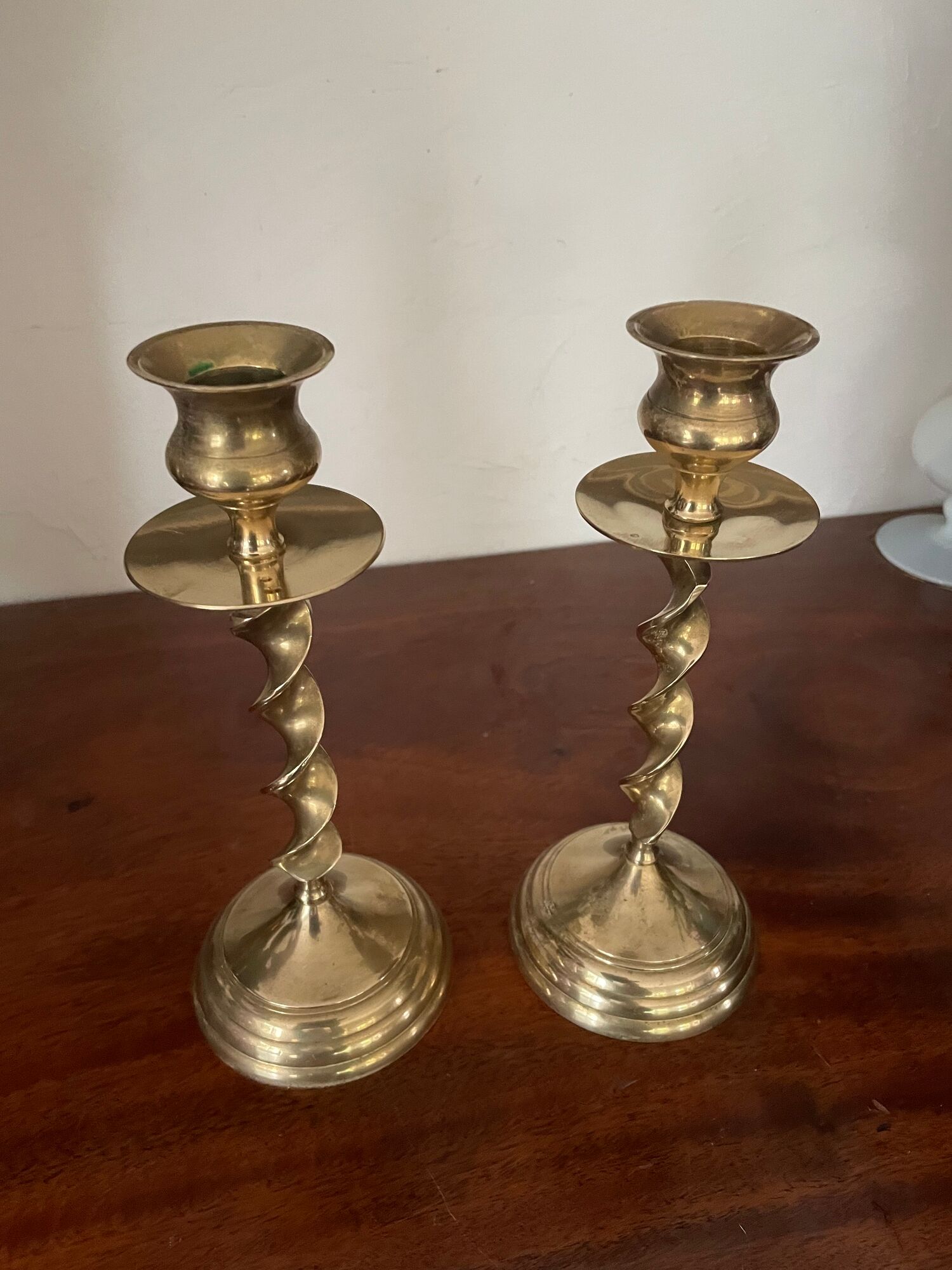 Pair of twisted brass candle holders