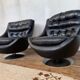 Pair of vintage swivel armchairs in black leather Tulip foot