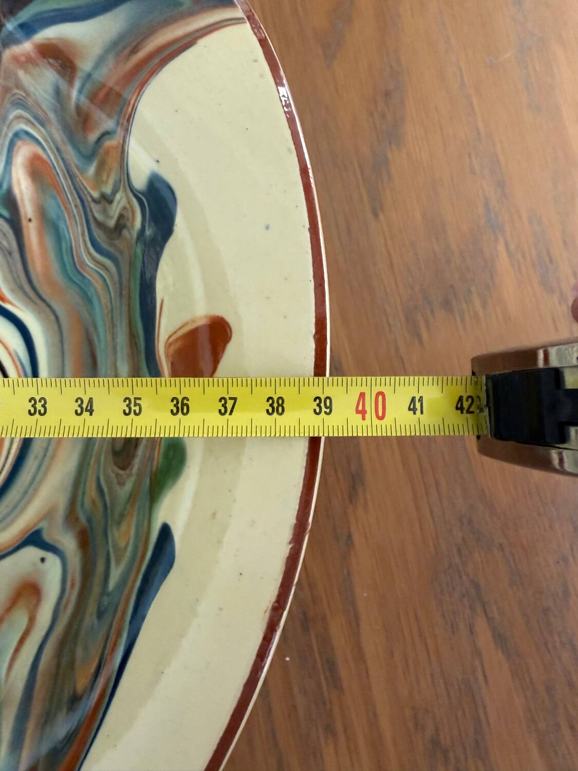 Glazed ceramic plate signed