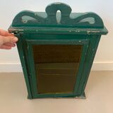 Wall vitrin with pediment