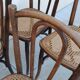 6 antique bistro chairs with curved wood and caning from 1900 L&H Cambier Frères