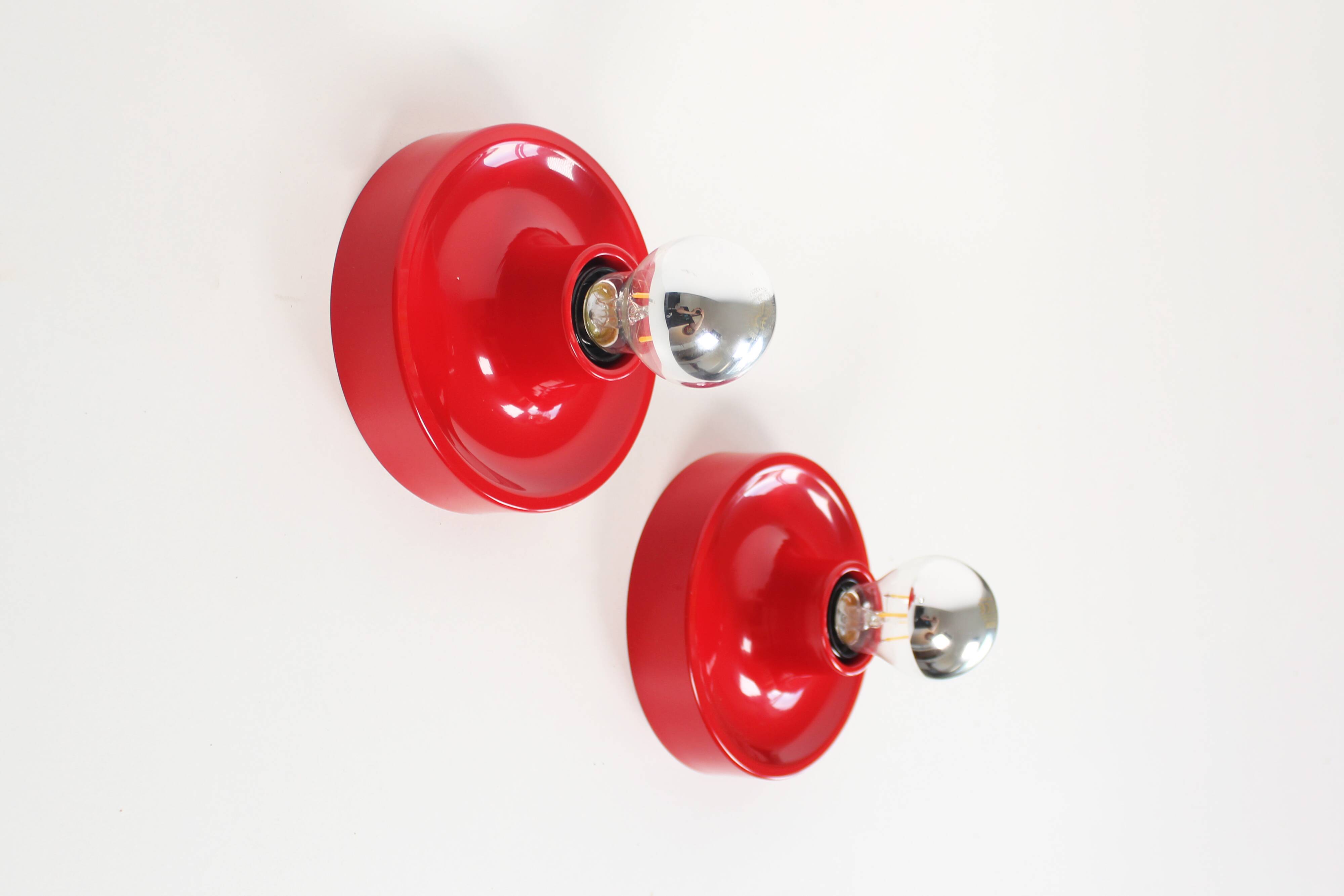 Pair of petite Disc sconces selected by Charlotte Perriand for Les Arcs