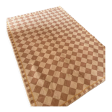 Beige checkerboard rug
