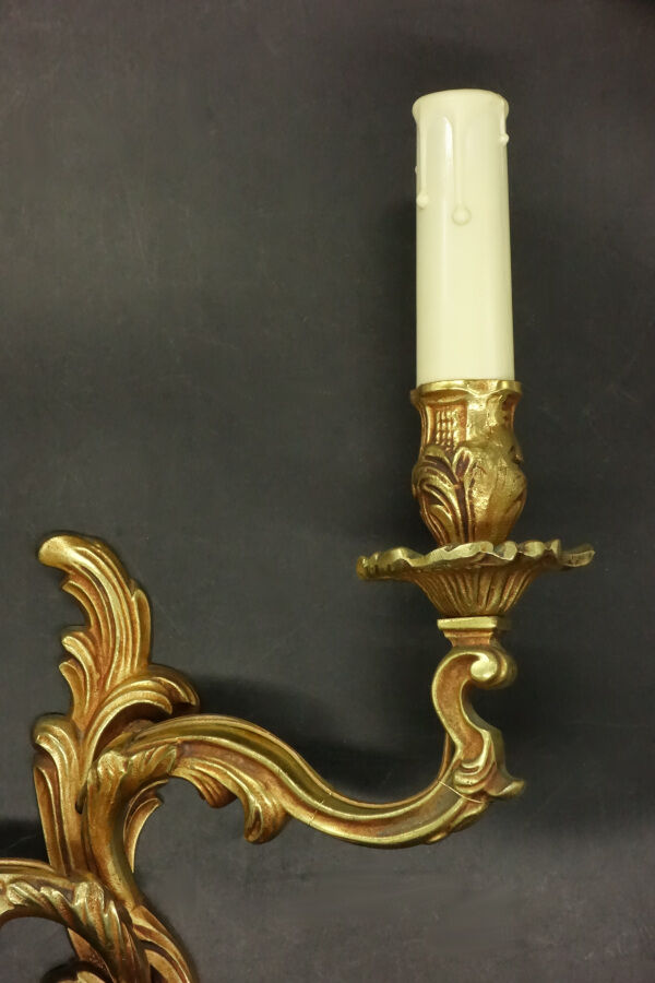 Pair of wall lamps stamped Louis XV style