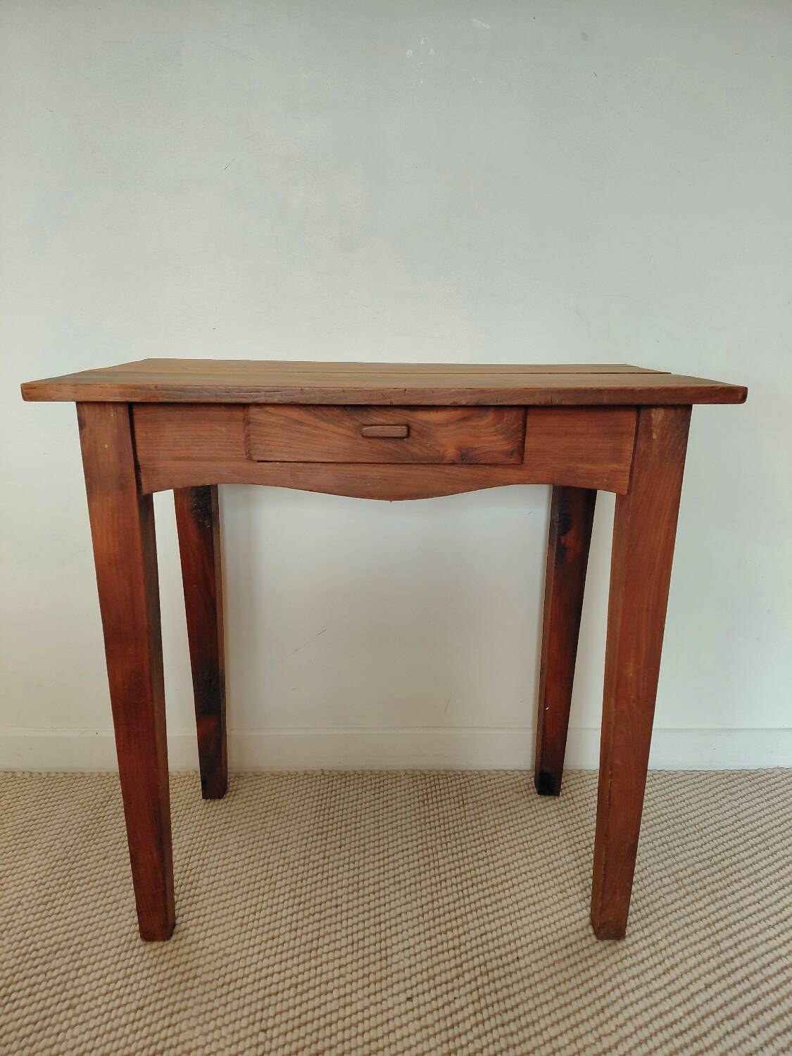 Small antique solid wood table in chic country style with a drawer.