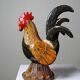 Small decorative rooster in handcrafted enameled ceramic folk art