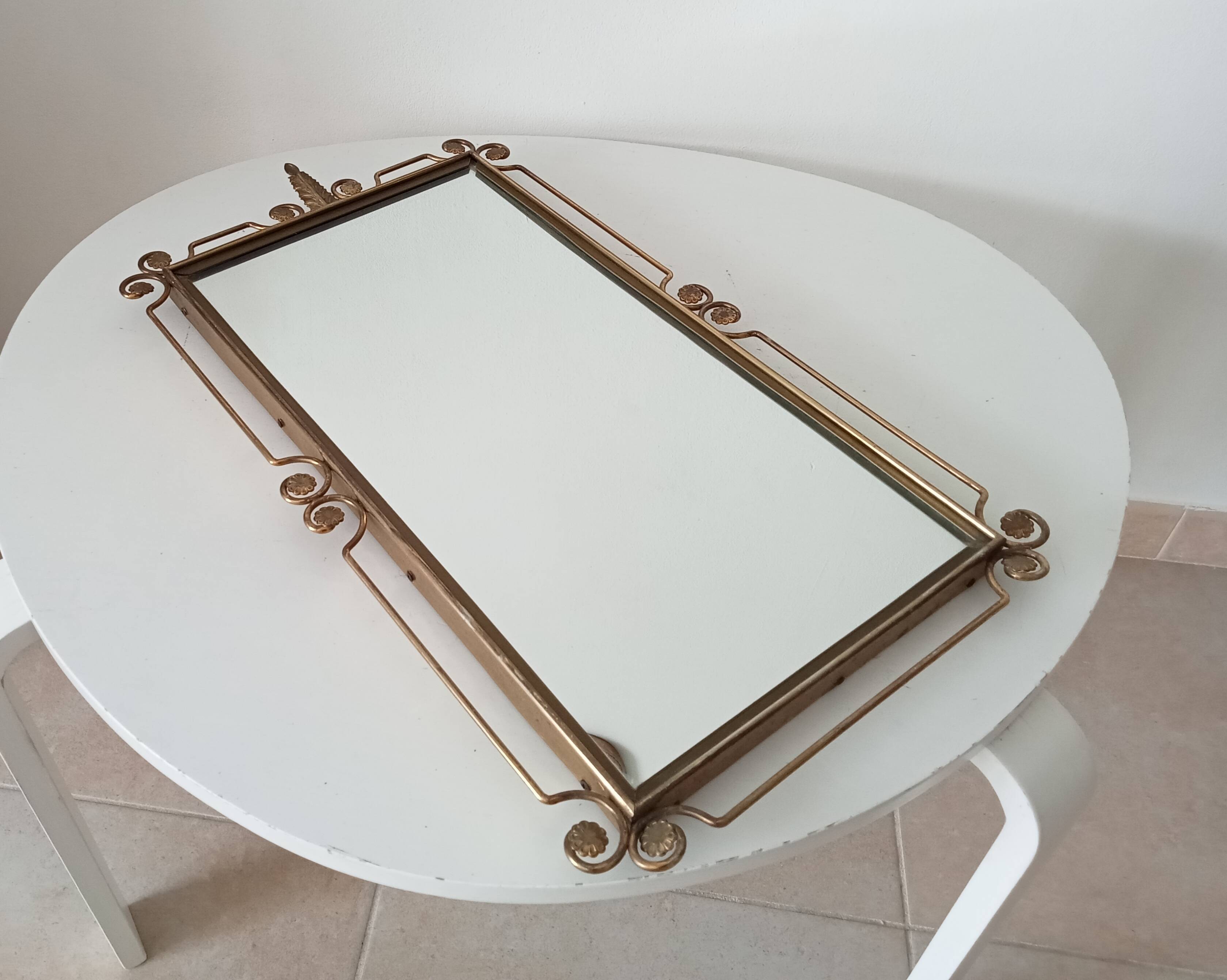 Vintage Hollywood Regency mirror from the 1950s.