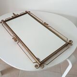 Vintage Hollywood Regency mirror from the 1950s.