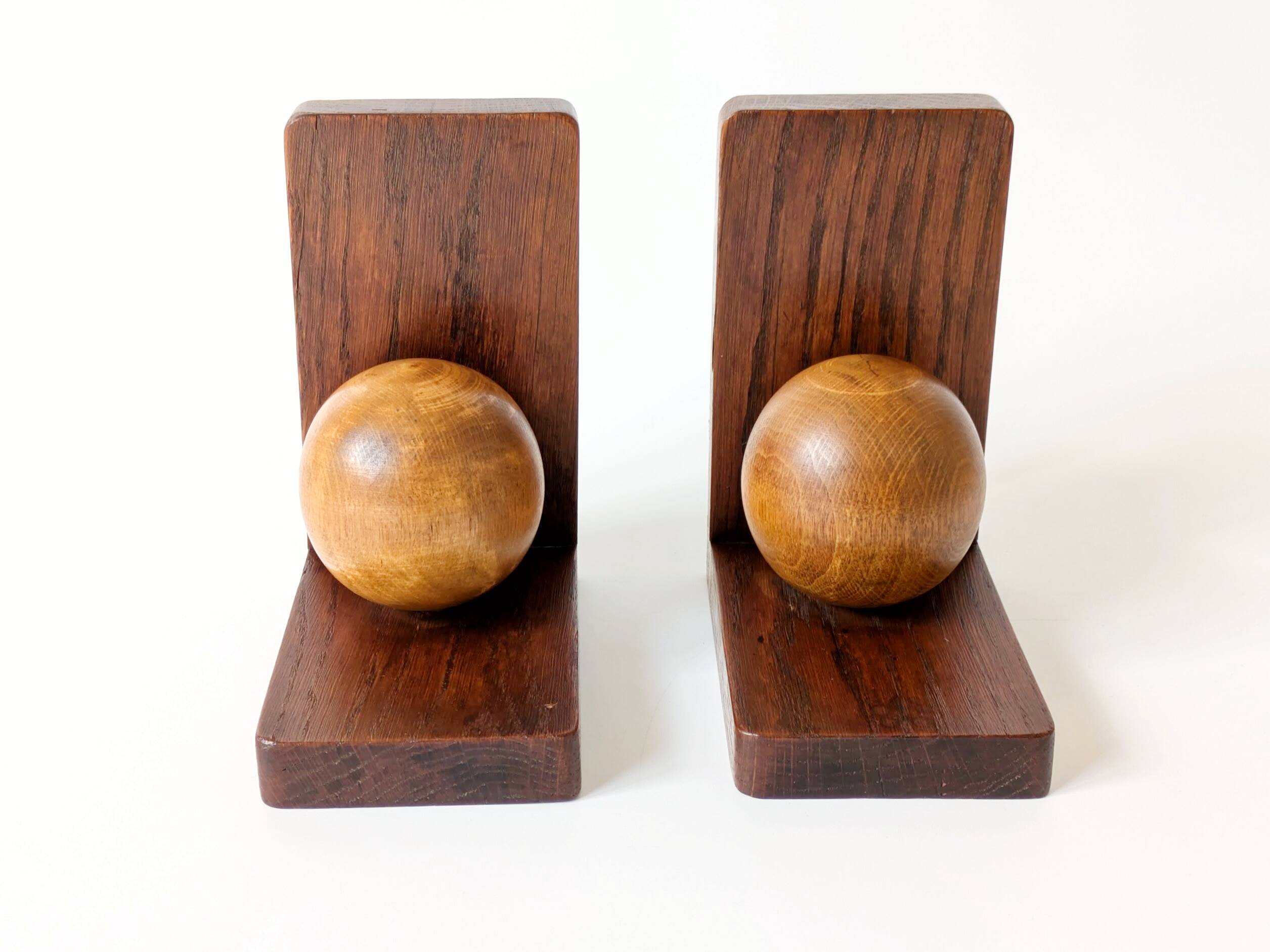 Pair of antique oak ball bookends, Midcentury Art Deco