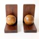 Pair of antique oak ball bookends, Midcentury Art Deco