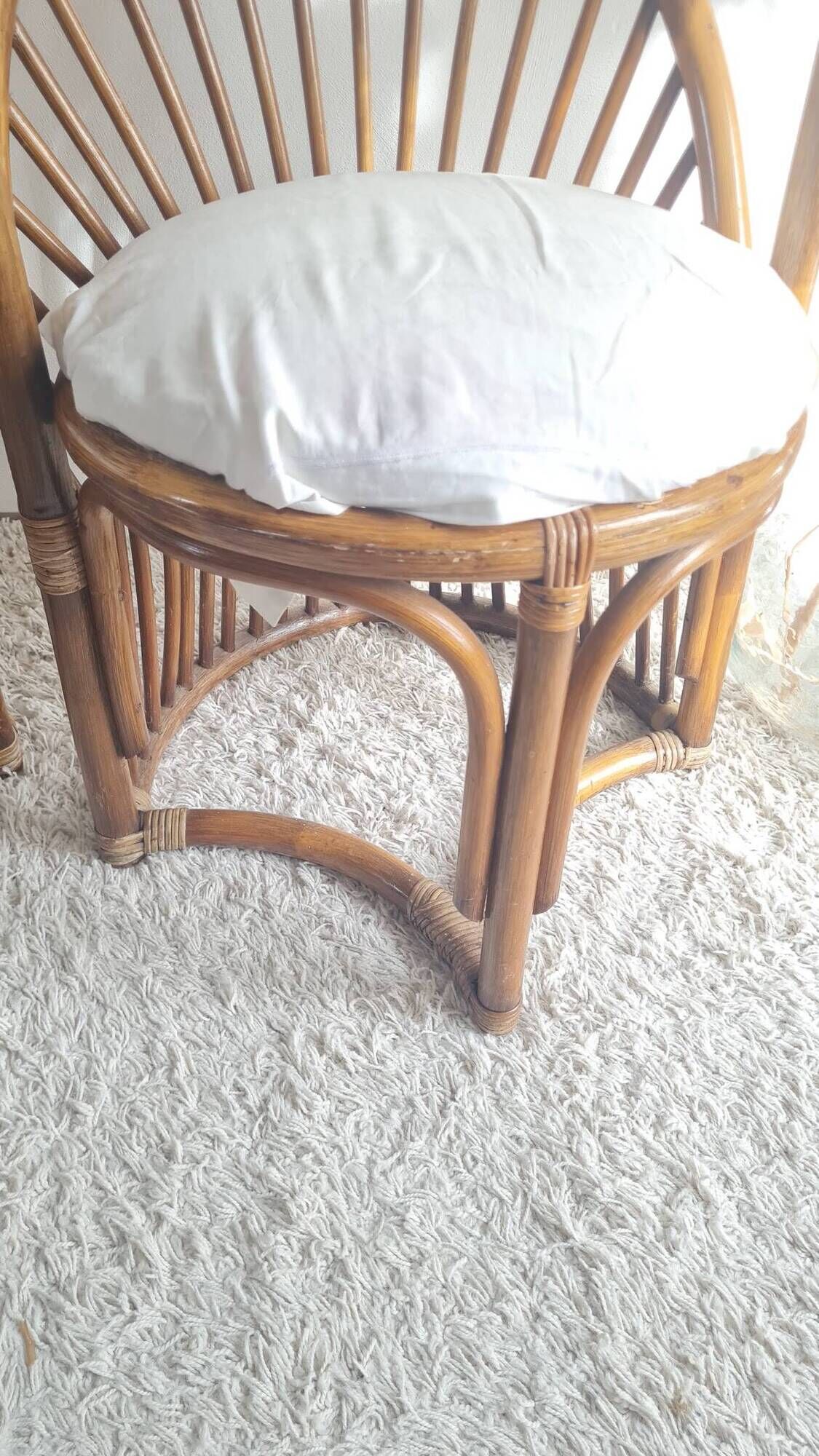 Pair of vintage rattan armchairs circa the 1960s.