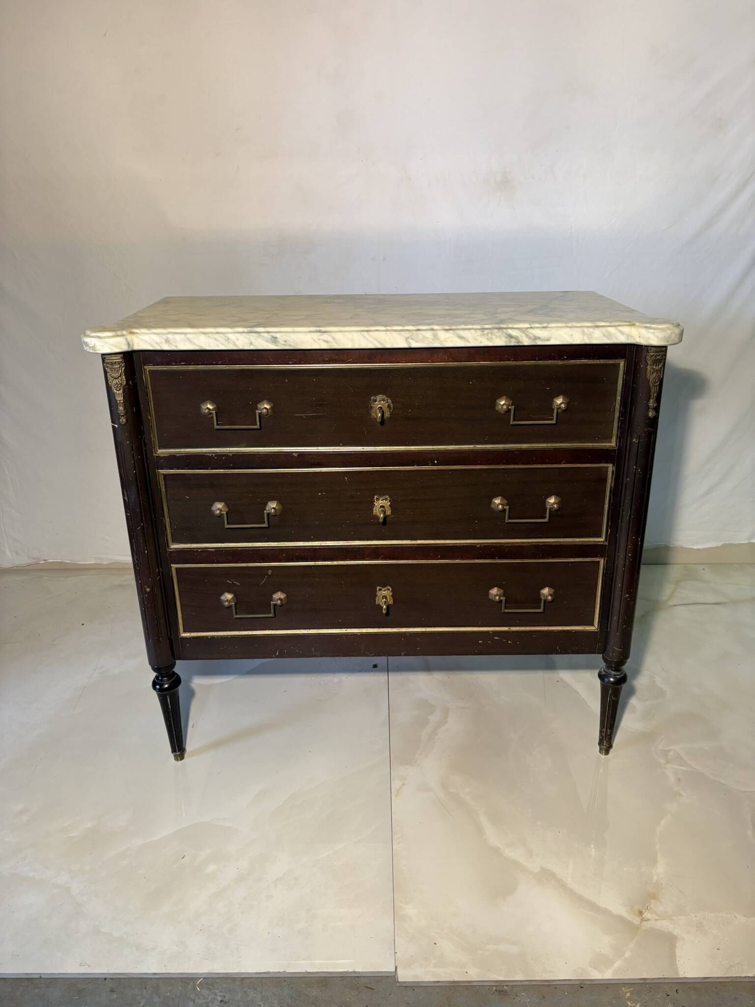 Commode with 3 drawers in Louis XVI style, marble and gilded bronze.